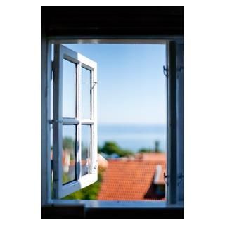 View of rooftop of house through open window Poster