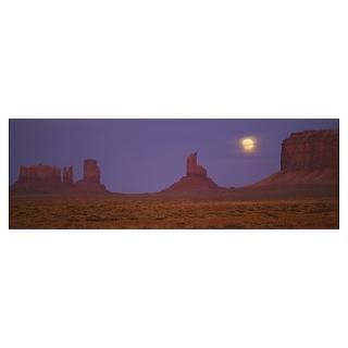 Moon shining over rock formations, Monument Valley Poster