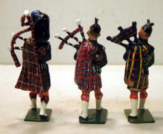 finely repained BRITAINS & J.HILL&CO lead SCOTTISH HIGHLAND PIPERS