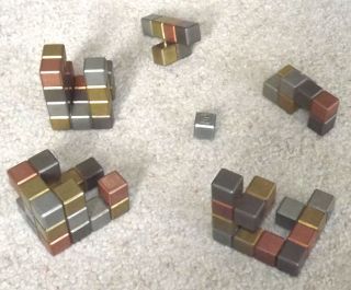 Metal Puzzle Cube in Copper Brass Aluminum Steel by Gare Maxton
