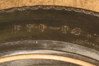 You are bidding on a good used Goodyear F70 14 Polyglas Tire Custom