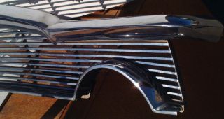 This is an original 1956 Packard Clipper grill and moldings shown.