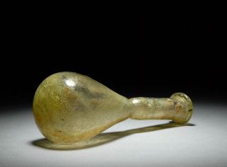 very beautiful ancient Roman glass bottle or unguentarium , dating