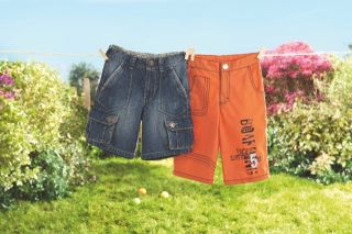Jungen Shorts Gr. 128 orange mit Print