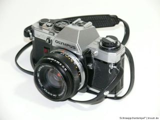 Kamera Olympus OM10 mit Objektiv OM System 11,8 50mm •