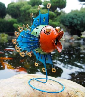 Fisch, Skulptur aus Metall als Teelichthalter. Ausdrucksstark und