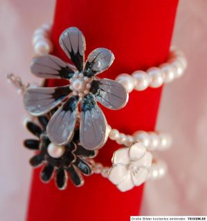 Reihen weiße Perlen 4 Blumen Armband elastisch Perlmutt schwarz