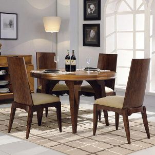 Round hardwood dining table with four chairs