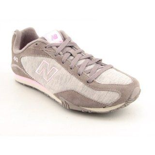 New Balance Womens WL442 Sneaker,Tan,7 B US Shoes